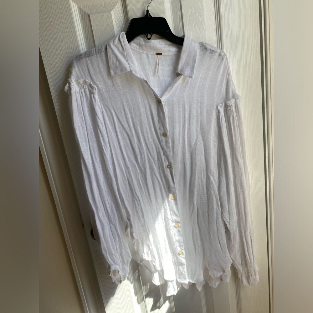 White gauzy free people blouse size large. NWT